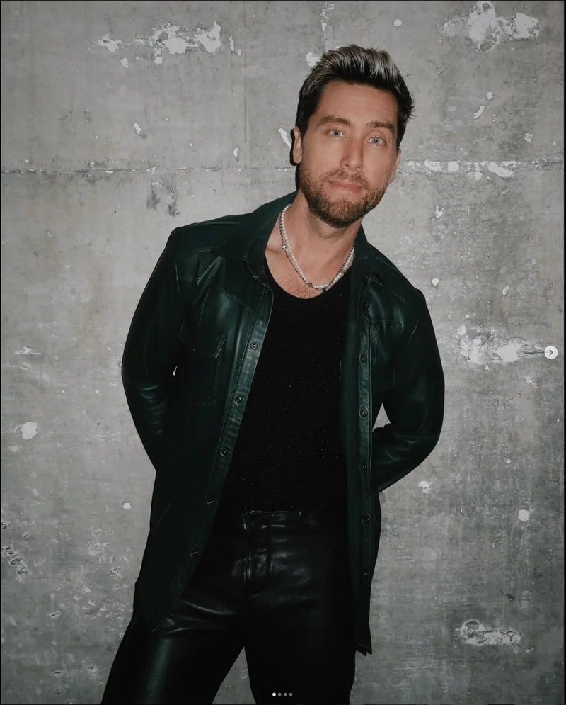Lance Bass of NSYNC wearing a matching Ron Tomson green lambskin leather shirt and pants