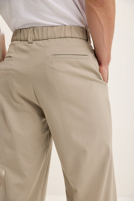 Men's Relaxed Pleated Trousers - Stone | Ron Tomson