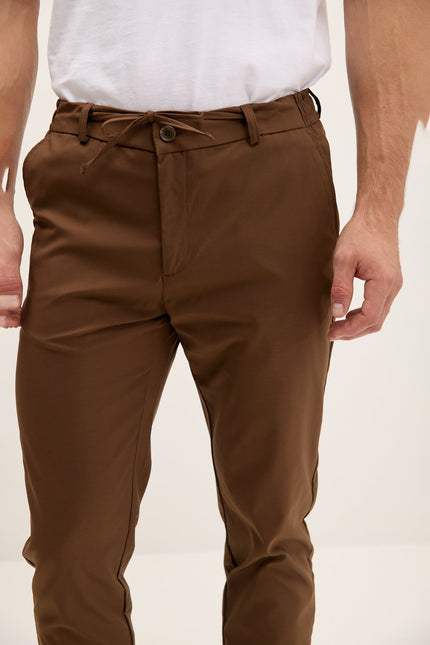 Men's Tapered Drawstring Travel Pants - Dark Brown | Ron Tomson