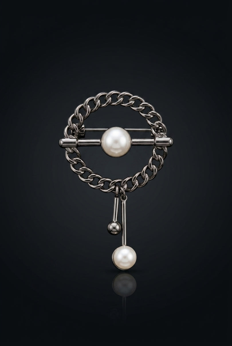 Brooch - Dark Gray And White circular with dangling elements - front