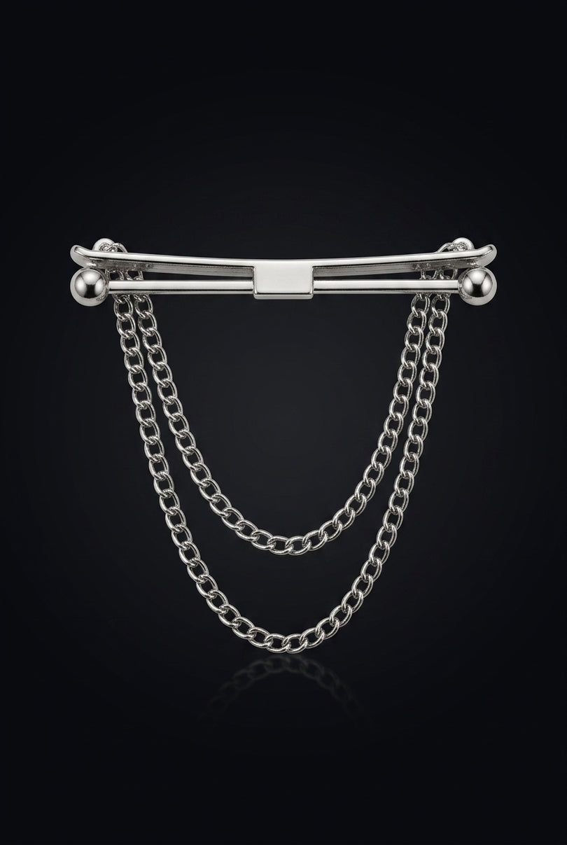 Brooch - Silver elongated bar with spherical ends and two draped chains - front
