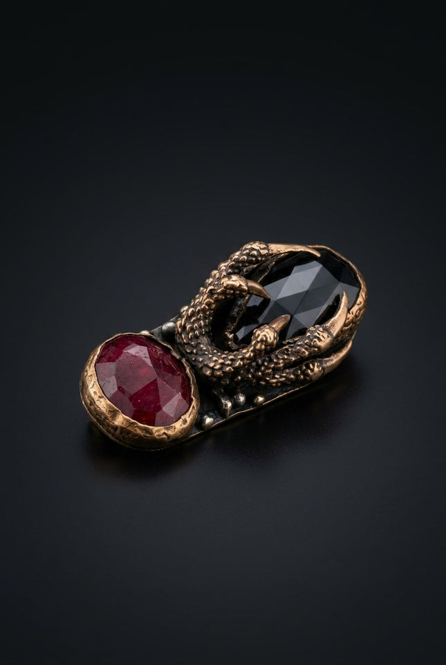 Brooch - Red, Black, Bronze elongated, two stones, claw setting - angle