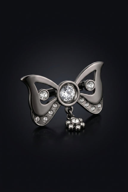 Brooch - Gunmetal bow_with_dangling_flower_charm - angle