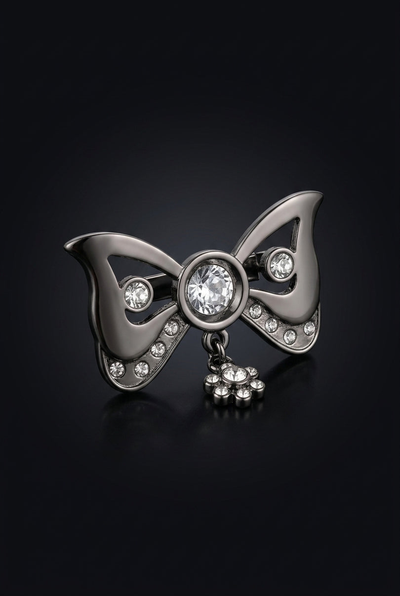 Brooch - Gunmetal bow_with_dangling_flower_charm - angle