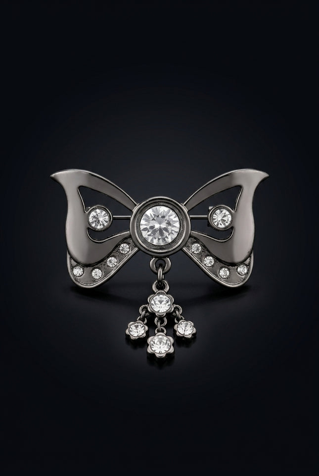 Brooch - Gunmetal bow_with_dangling_flower_charm - front