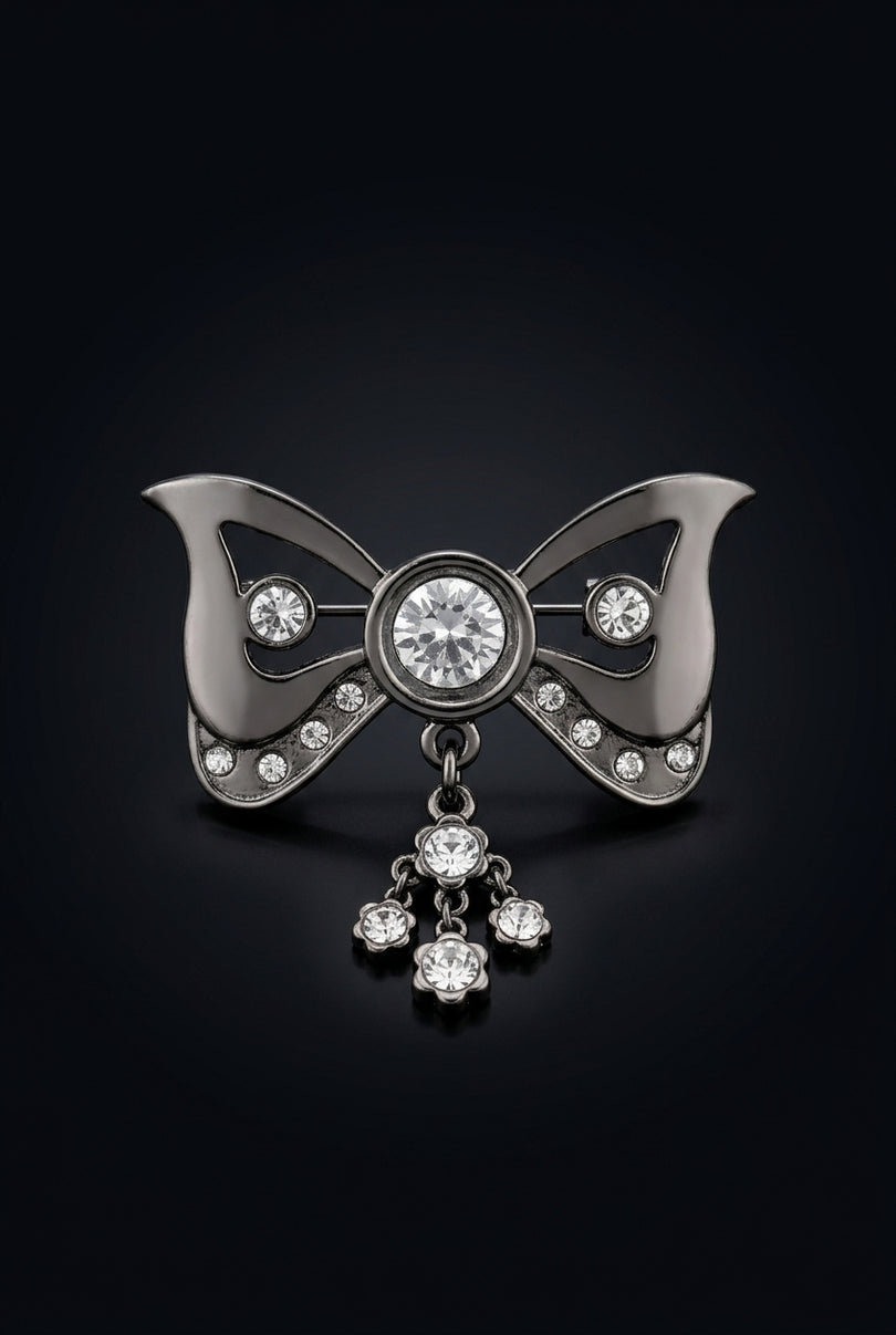 Brooch - Gunmetal bow_with_dangling_flower_charm - front