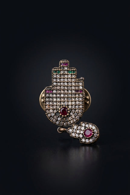 Brooch - Dark Metal, Clear, Red, Green Stones hamsa hand - front