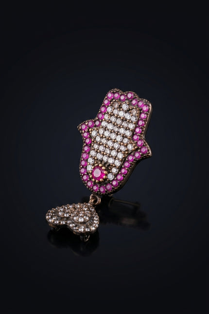 Brooch - Ruby, Crystal, Dark Metal Hamsa hand with dangling cluster - angle
