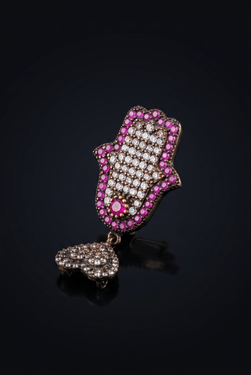 Brooch - Ruby, Crystal, Dark Metal Hamsa hand with dangling cluster - angle