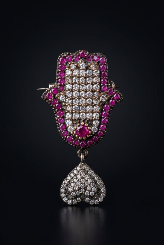Brooch - Ruby, Crystal, Dark Metal Hamsa hand with dangling cluster - front