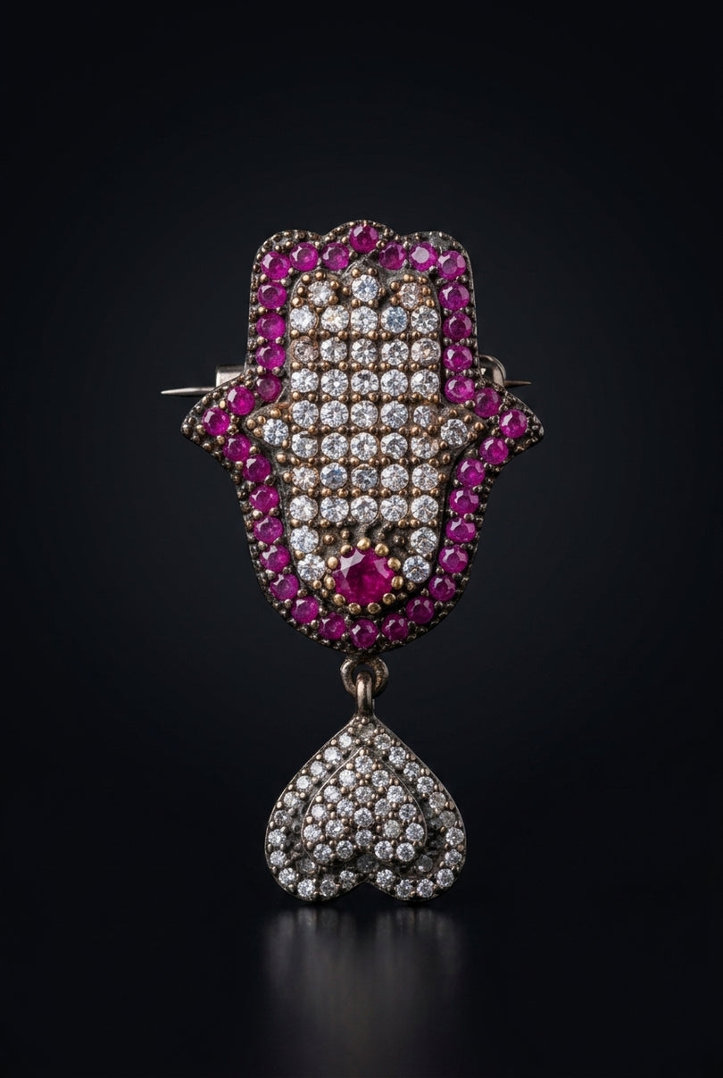 Brooch - Ruby, Crystal, Dark Metal Hamsa hand with dangling cluster - front