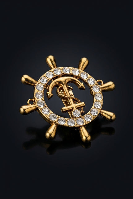 Brooch - Gold circular ship wheel with anchor - angle