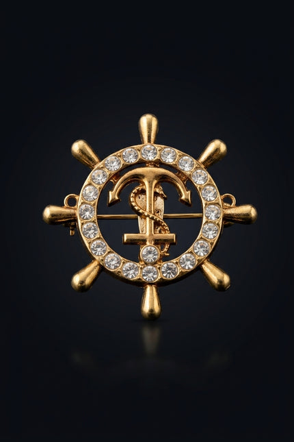 Brooch - Gold circular ship wheel with anchor - front