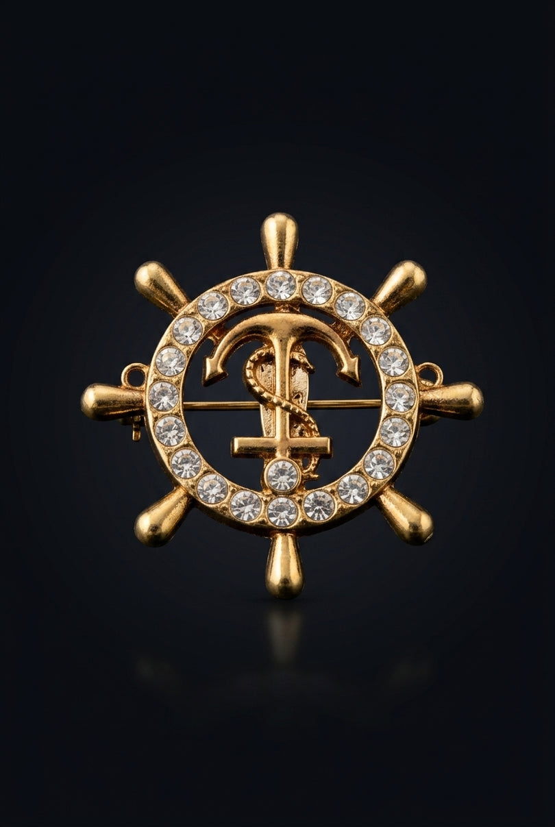 Brooch - Gold circular ship wheel with anchor - front