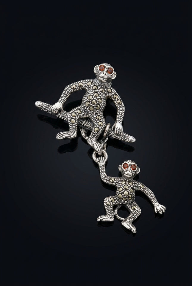 Brooch - Silver, Black, Red two linked monkey figures - angle