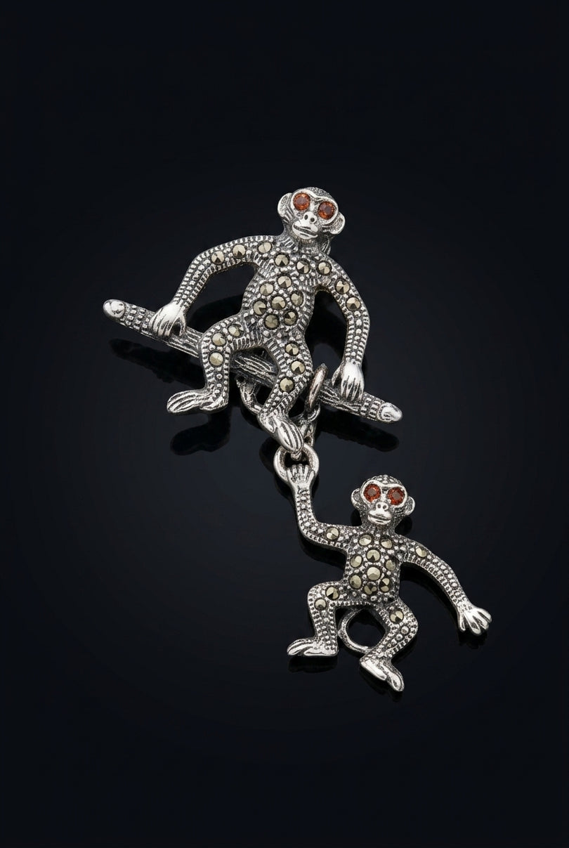 Brooch - Silver, Black, Red two linked monkey figures - angle