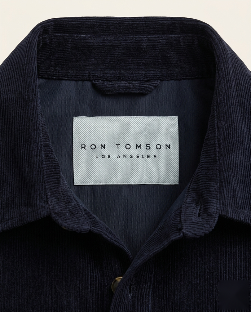 Men's navy corduroy shirt jacket — inside-neck Ron Tomson woven label detail