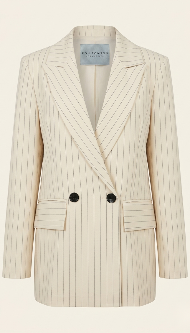 Women's pinstripe peak lapel suit in beige — front view