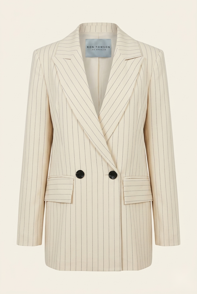 Women's pinstripe peak lapel suit in beige — front view