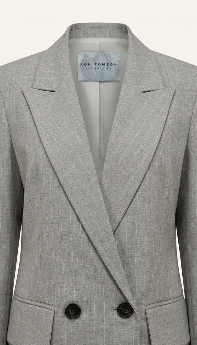 Women's pinstripe peak lapel suit in grey — peak lapel and woven Ron Tomson label detail