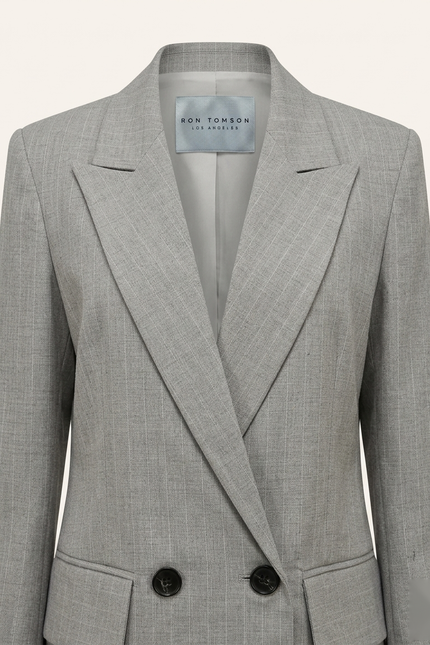 Women's pinstripe peak lapel suit in grey — peak lapel and woven Ron Tomson label detail