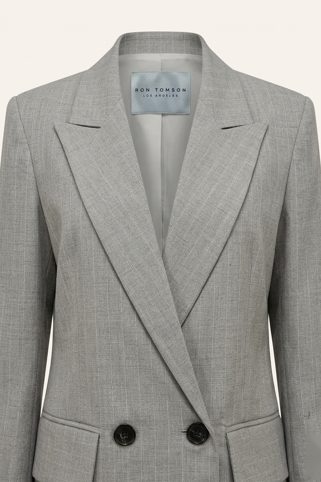 Women's pinstripe peak lapel suit in grey — peak lapel and woven Ron Tomson label detail