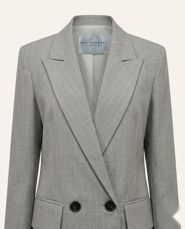 Women's pinstripe peak lapel suit in grey — peak lapel and woven Ron Tomson label detail