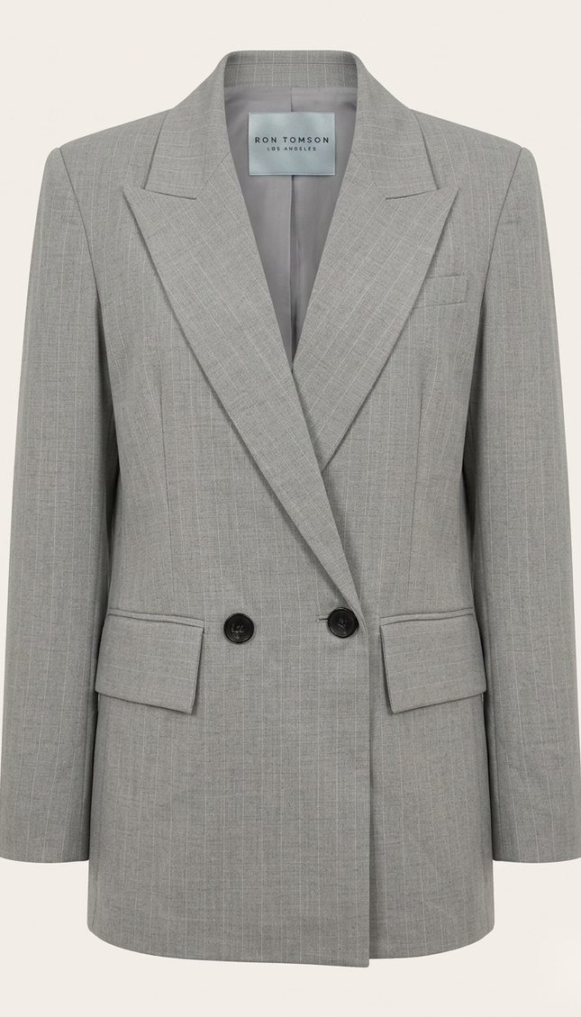 Women's pinstripe peak lapel suit in grey — front view