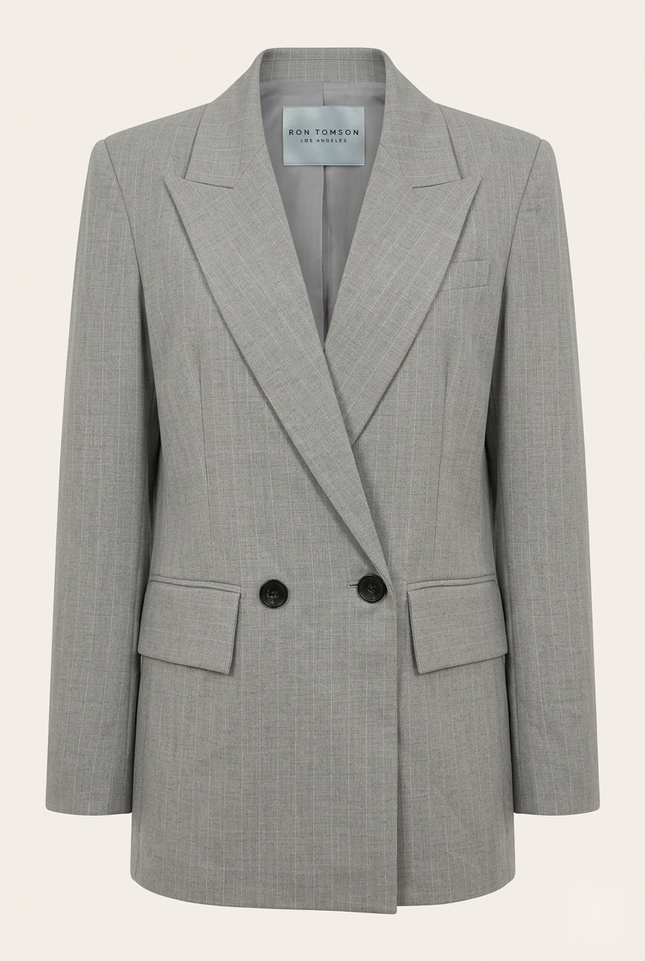 Women's pinstripe peak lapel suit in grey — front view